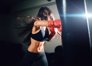 girl-hitting-heavy-bags